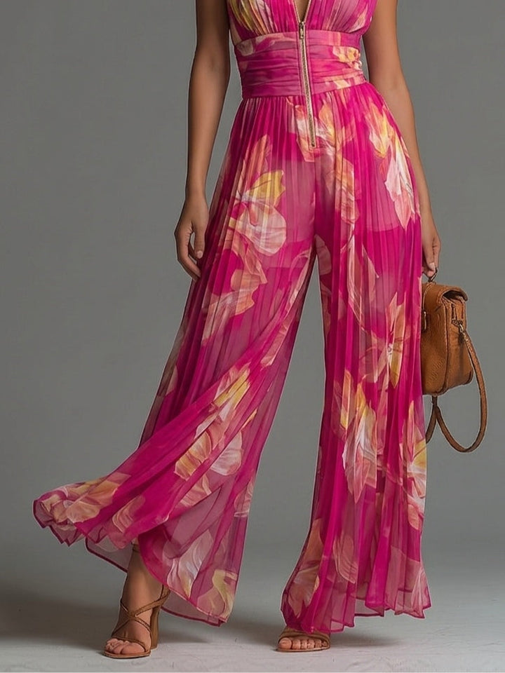 Bloom Jumpsuit | Pleated jumpsuit with a fuchsia floral print